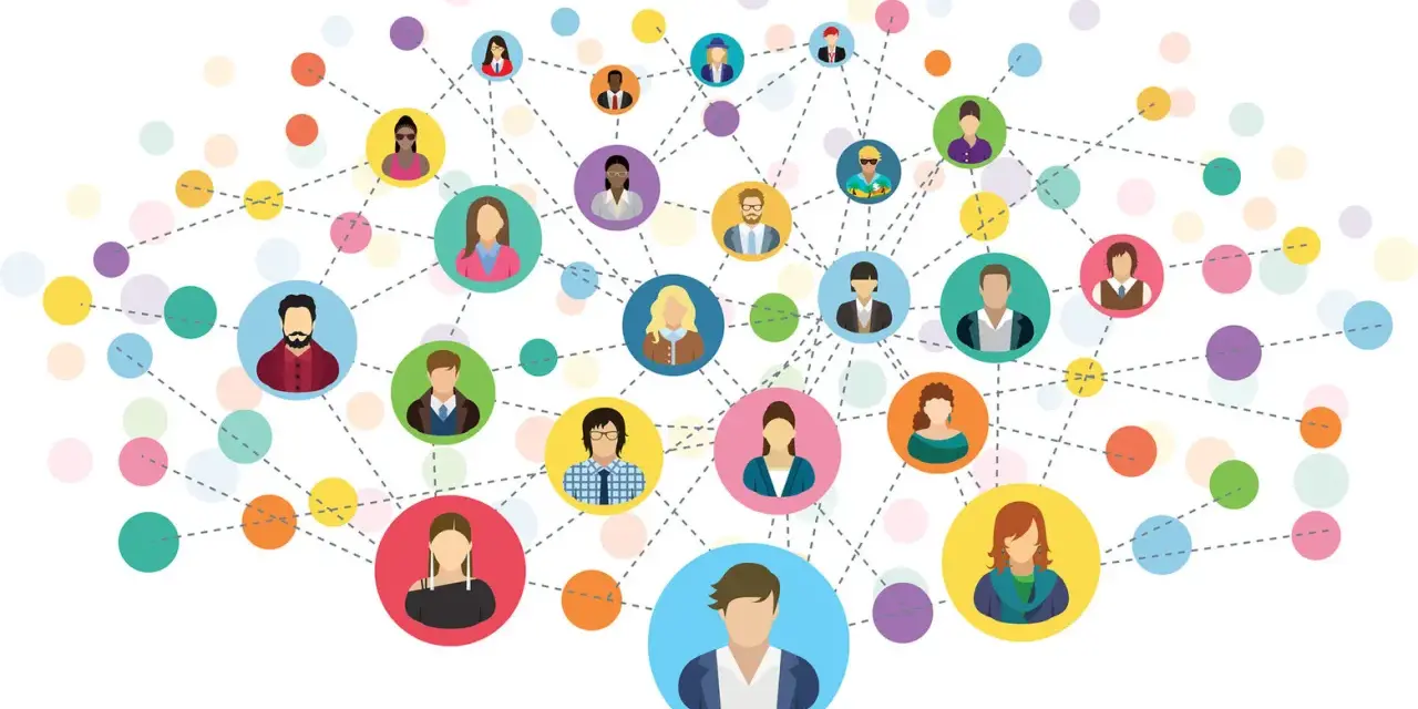 Sieć kontaktów, czyli networking jak zacząć. Kolorowe kółka z ikonami ludzi połączone liniami, symbolizujące relacje.