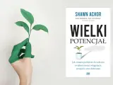 Zielona dłoń trzyma pęd rośliny, symbolizując rozwój i potencjał, jak w książce "Wielki Potencjał". To inspiracja dla osób o osobowości ISFP, szukających wzrostu.