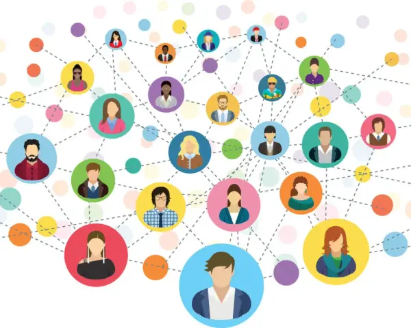 Sieć kontaktów, czyli networking jak zacząć. Kolorowe kółka z ikonami ludzi połączone liniami, symbolizujące relacje.
