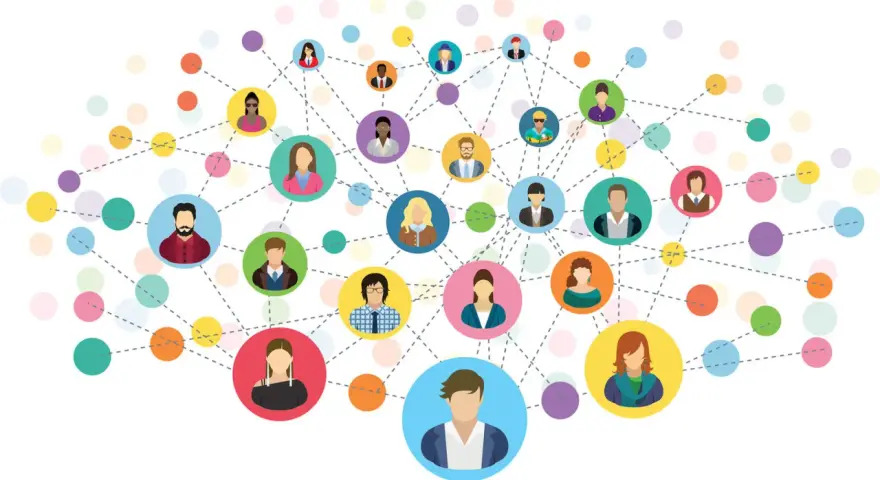 Sieć kontaktów, czyli networking jak zacząć. Kolorowe kółka z ikonami ludzi połączone liniami, symbolizujące relacje.