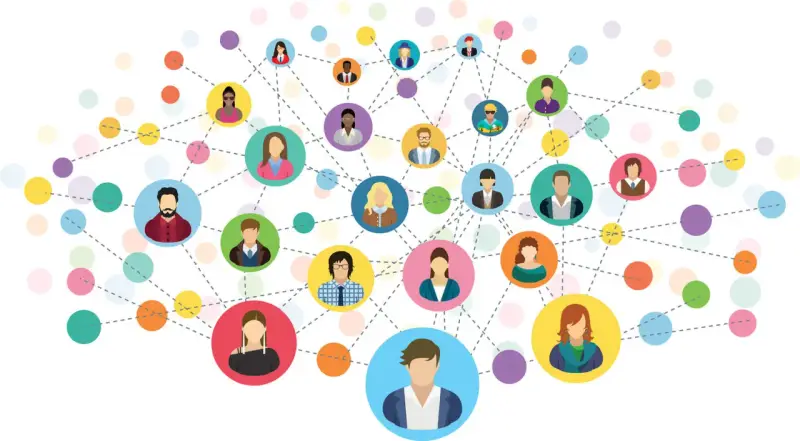 Sieć kontaktów, czyli networking jak zacząć. Kolorowe kółka z ikonami ludzi połączone liniami, symbolizujące relacje.